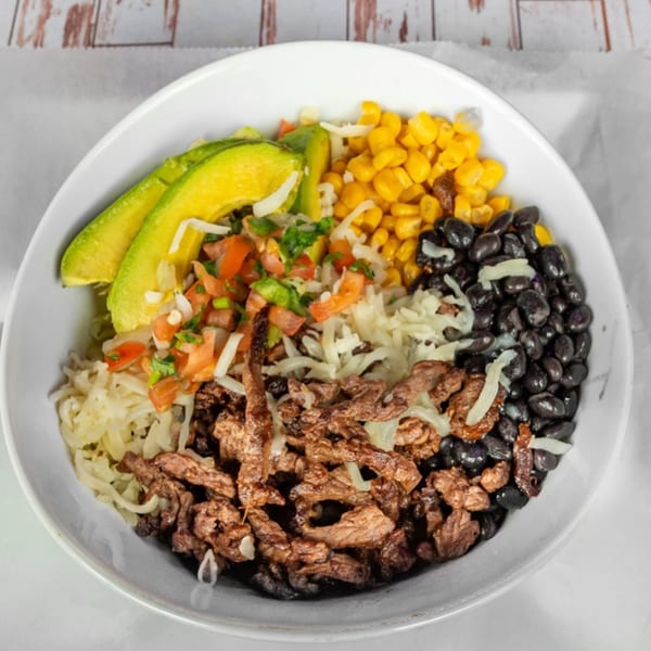 Lomeli's Mexican Bar and Grill's steak burrito bowl with avocado, corn, black beans, and pico de gallo.